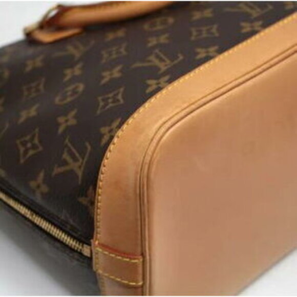 Louis Vuitton Alma Monogram Handbag - Picture 6 of 6